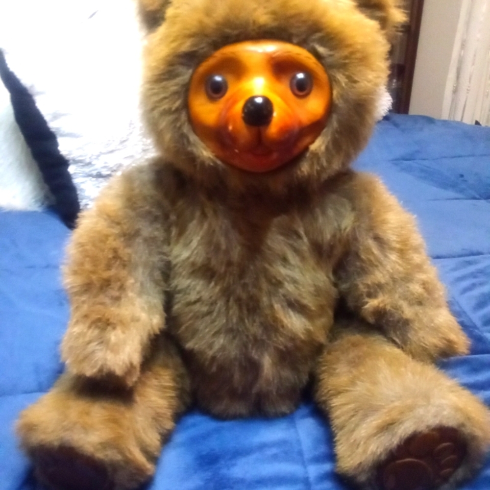 Vintage jointed wood face bear